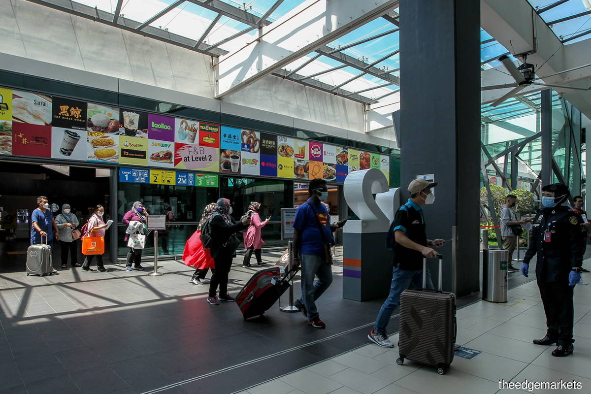 Terminal Bersepadu Selatan, Bandar Tasik Selatan, Kuala Lumpur. Cumulatively, 2,353,579 infections have been detected so far since the pandemic began in the country. (Photo by Mohamad Shahrill Basri/The Edge)